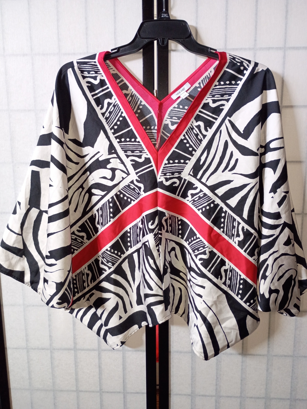 Nine West Black & White Graphic V-Neck Blouse with Red Accents